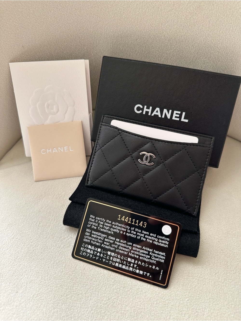 CHANEL Black Quilted Card Holder with Silver CC Logo - Picture 7 of 7